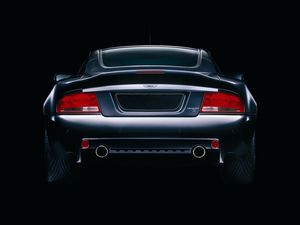 Превью обои aston martin, v12, vanquish, 2004, черный, вид сзади, стиль, астон мартин