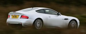 Превью обои aston martin, v12, vanquish, 2004, белый, вид сбоку, астон мартин, скорость