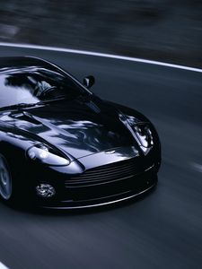 Превью обои aston martin, v12, vanquish, 2004, черный, вид спереди, стиль, астон мартин, асфальт