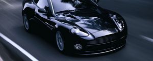 Превью обои aston martin, v12, vanquish, 2004, черный, вид спереди, стиль, астон мартин, асфальт