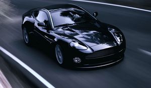 Превью обои aston martin, v12, vanquish, 2004, черный, вид спереди, стиль, астон мартин, асфальт