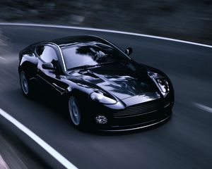 Превью обои aston martin, v12, vanquish, 2004, черный, вид спереди, стиль, астон мартин, асфальт