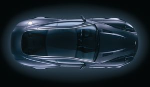 Превью обои aston martin, v12, vanquish, 2004, черный, вид спереди, стиль