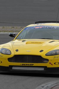 Превью обои aston martin, v8, vantage, 2009, желтый, вид спереди, стиль, астон мартин, асфальт