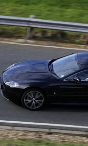 Превью обои aston martin, v8, vantage, 2010, черный, вид сбоку, стиль, астон мартин, скорость