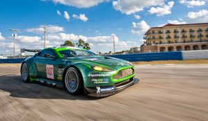 Превью обои aston martin, v8, vantage, 2009, зеленый, вид сбоку, спорт, астон мартин, скорость