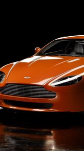 Превью обои aston martin, v8, vantage, 2008, оранжевый, вид спереди, отражение