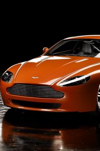 Превью обои aston martin, v8, vantage, 2008, оранжевый, вид спереди, отражение