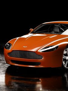 Превью обои aston martin, v8, vantage, 2008, оранжевый, вид спереди, отражение