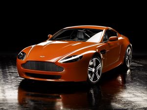 Превью обои aston martin, v8, vantage, 2008, оранжевый, вид спереди, отражение