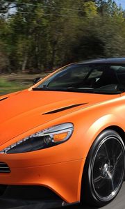 Превью обои aston martin, vanquish orange, оранжевый, скорость, вид спереди