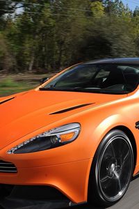 Превью обои aston martin, vanquish orange, оранжевый, скорость, вид спереди