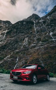 Превью обои авто, красный, горы, камни