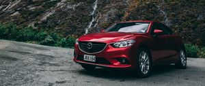 Превью обои авто, красный, горы, камни