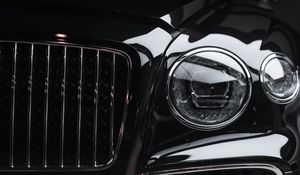 Превью обои автомобиль, фара, черный, вид спереди, крупным планом