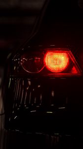 Превью обои автомобиль, фонарь, красный, темный, подсветка