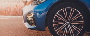 Превью обои автомобиль, колесо, синий, вид сбоку