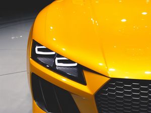 Превью обои автомобиль, спорткар, фара, желтый, вид спереди