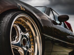 Превью обои автомобиль, спорткар, колесо, вид снизу, черный