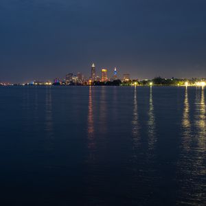 Превью обои башни, огни, здания, река, город