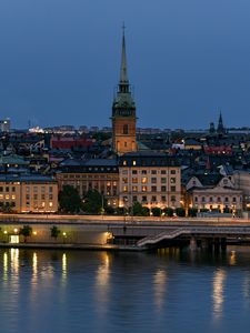 Превью обои башня, здания, огни, набережная, река, сумерки