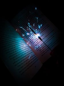 Превью обои бенгальский огонь, искры, книга, текст