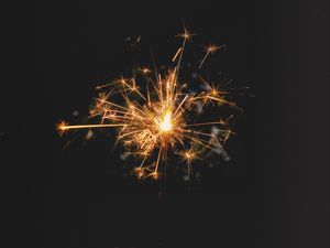 Превью обои бенгальский огонь, искры, темный фон