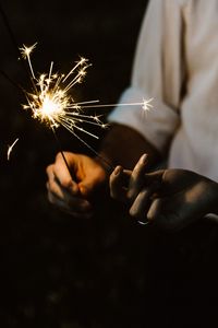 Превью обои бенгальский огонь, руки, искры