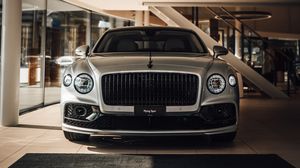 Превью обои bentley flying spur, bentley, автомобиль, серый, вид спереди