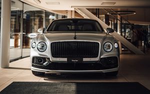 Превью обои bentley flying spur, bentley, автомобиль, серый, вид спереди