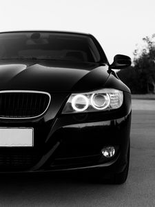 Превью обои bmw, автомобиль, черный, фара, вид спереди