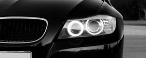 Превью обои bmw, автомобиль, черный, фара, вид спереди