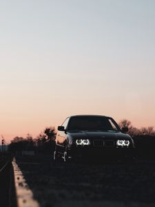 Превью обои bmw, автомобиль, черный, фары, свет, сумерки