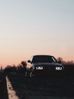 Скачать 24320 Bmw, Автомобиль, Черный, Фары, Свет, Сумерки Обои.