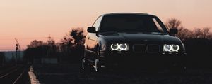 Превью обои bmw, автомобиль, черный, фары, свет, сумерки