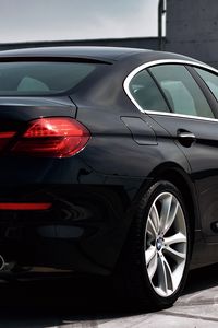 Превью обои bmw, автомобиль, фара, колесо, вид сбоку