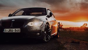 Превью обои bmw, автомобиль, вид спереди, фары, свечение, черный