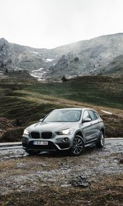 Превью обои bmw, автомобиль, внедорожник, горы, скалы