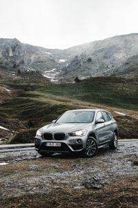 Превью обои bmw, автомобиль, внедорожник, горы, скалы