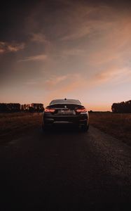 Превью обои bmw m4, bmw, автомобиль, спорткар, вид сзади, фары