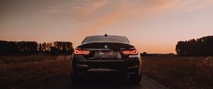 Превью обои bmw m4, bmw, автомобиль, спорткар, вид сзади, фары