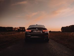 Превью обои bmw m4, bmw, автомобиль, спорткар, вид сзади, фары