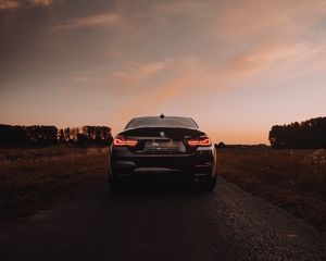 Превью обои bmw m4, bmw, автомобиль, спорткар, вид сзади, фары