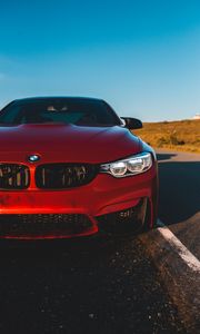 Превью обои bmw m4, bmw, автомобиль, вид спереди, фара, красный