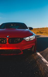 Превью обои bmw m4, bmw, автомобиль, вид спереди, фара, красный