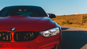 Превью обои bmw m4, bmw, автомобиль, вид спереди, фара, красный