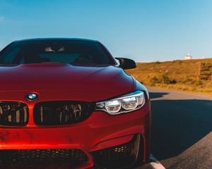 Превью обои bmw m4, bmw, автомобиль, вид спереди, фара, красный