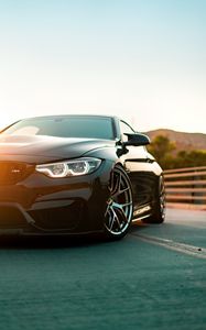 Превью обои bmw m4, bmw, автомобиль, вид спереди, фара, черный