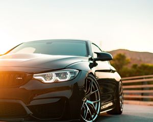 Превью обои bmw m4, bmw, автомобиль, вид спереди, фара, черный