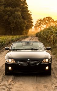 Превью обои bmw, машина, вид спереди, фара, дорога